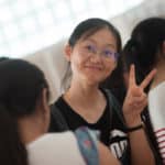Daisy Qiu poses for a photo inside the High Museum of Art.