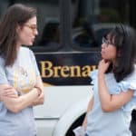 Jordan Anderson, director of international students & programs, speaks with Lynn Lu on Brenau's Historic Gainesville Campus.