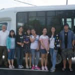 Mike Lochstampfor, athletic director & head soccer coach, Bill Felt, driver, Lynn Lu, Daisy Qiu, Lavender Qin, Cathy Wu, Crystal Wang, Iris Shi, Harry Deng, and Eugene Williams, dean of the College of Education, pose for a photo after breakfast.