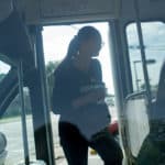 Daisy Qiu boards the bus after breakfast.