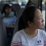 Crystal Wang looks out the window while riding through Atlanta.