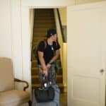 Harry Deng moves into his room in the Guest House student residence hall.
