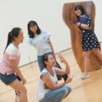 Cathy Wu snaps a photo inside the High Museum of Art while, from left to right, Crsytal Wang, Lynn Lu and Lavender Qin look on.