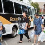 From left to right, Alice Han, Harry Deng, Daisy Qiu, Lynn Lu and Cherry Hong make their way to their residence halls after a shopping trip.